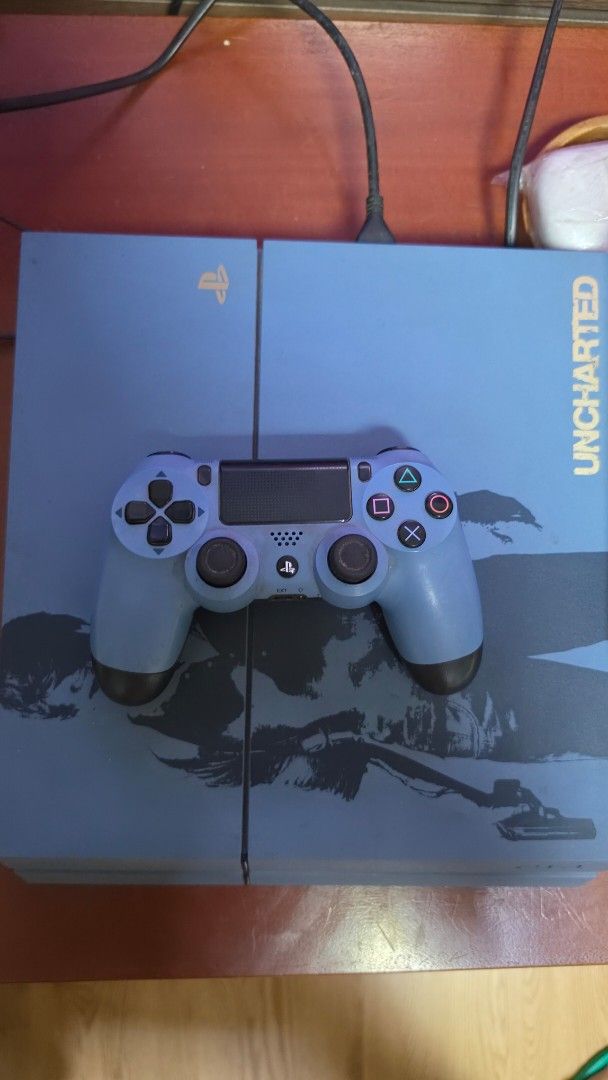 PS4 500GB Uncharted Limited Edition (w/ Matching Controller) (Category: PlayStation) located in Manila. Submitted by kurigohan07 (Listing ID 1471031717, Image 1). Description: Selling pre-loved, authentic PS4 Uncharted 4 Limited Edition Console. Unit is in great cosmetic condition with the original Nathan Drake silk-screened top plate art still looking very clean. Perfect for casual gamers or collectors looking for a unique, limited-edition theme