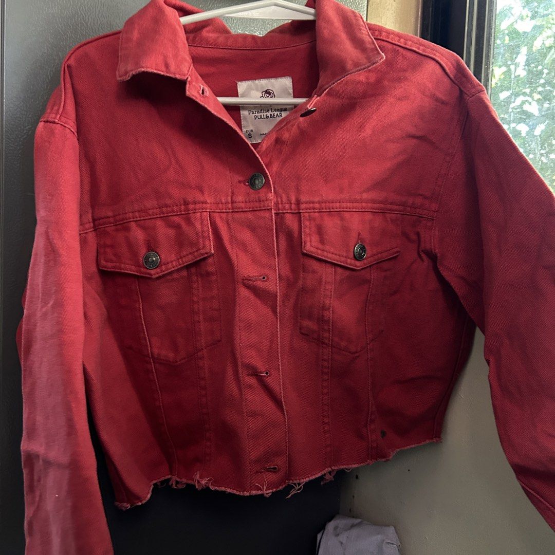 Pull & Bear Paradise League Red Denim Jacket (Category: Coats, Jackets and Outerwear) located in Manila. Submitted by tasha_11 (Listing ID 1471058992, Image 1). Description: - Brand: Pull & Bear (Paradise League collection) - Color: Vibrant Red - Size: S (EUR S, MEX 26) - Features: Classic collar, button-up front, two chest pockets, trendy raw hem detail - Condition: Great staple outerwear piece - Made in China.