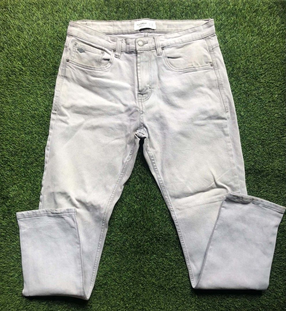 Pull&Bear Grey Denim Jeans Size EUR 42 (Category: Jeans) located in Taguig. Submitted by villajoseph318 (Listing ID 1470971087, Image 1). Description: - Brand: Pull&Bear - Size: EUR 42 / MEX 32 - Color/Wash: Light wash grey denim - Fit: Regular fit - Material/Origin: Made in Bangladesh - Features: Classic five-pocket design, branded button closure, and back pocket logo tag - Condition: Clean stitching with standard belt loops.