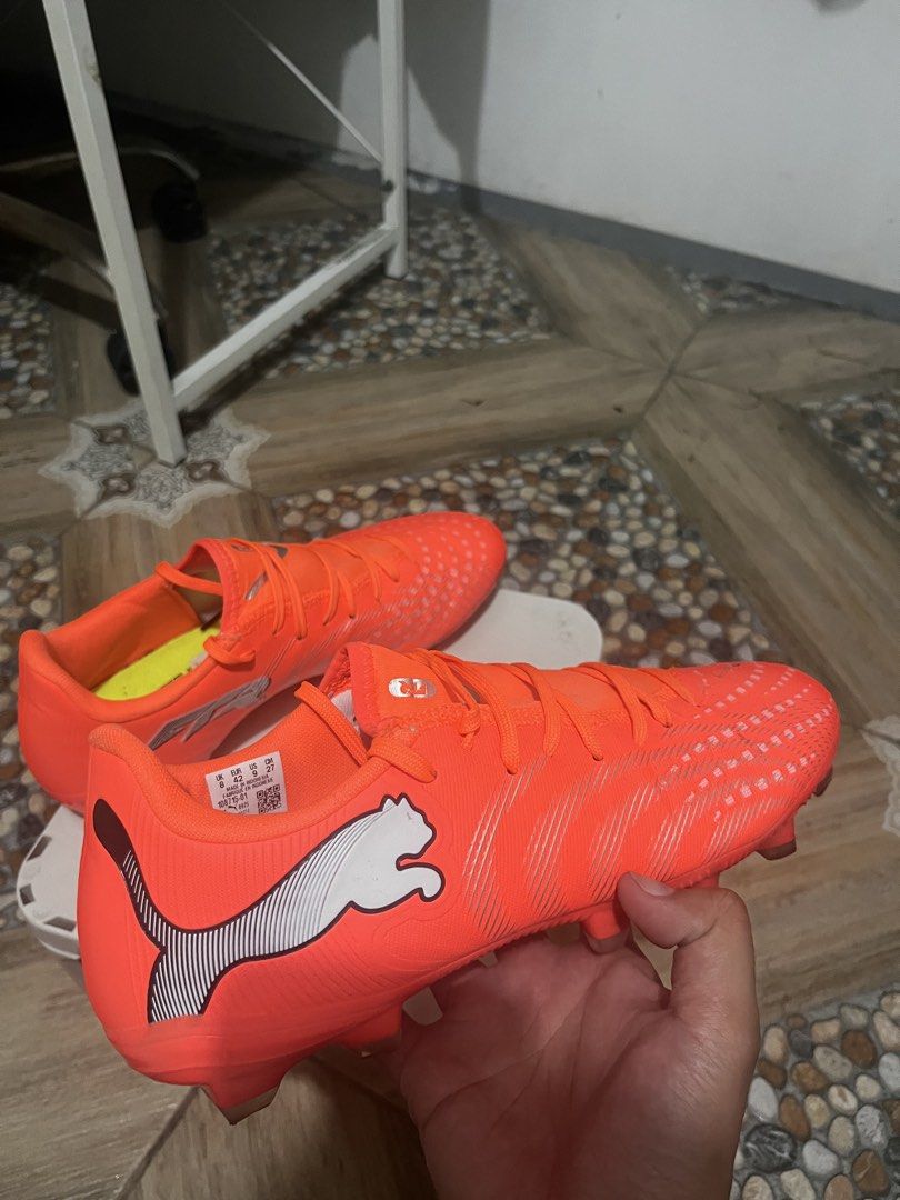 Puma Future Match FG/AG Orange Soccer Cleats (Category: Sneakers) located in Taguig. Submitted by sanji22 (Listing ID 1471047565, Image 3). Description: Selling my 1 week old Puma Future 9 Play football boots. Only used twice good as brand new. Bought it for 3,200 and selling it now for only P1,700 RFS: Too big - Brand: Puma - Color: Bright orange with silver branding - Size: US 9 / UK 8 / EUR 42 / 27 cm - Condition: Clean inside and out - Featur