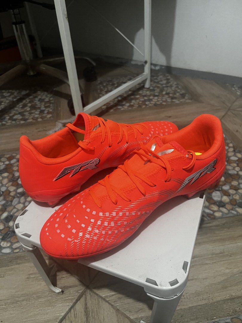 Puma Future Match FG/AG Orange Soccer Cleats (Category: Sneakers) located in Taguig. Submitted by sanji22 (Listing ID 1471047565, Image 2). Description: Selling my 1 week old Puma Future 9 Play football boots. Only used twice good as brand new. Bought it for 3,200 and selling it now for only P1,700 RFS: Too big - Brand: Puma - Color: Bright orange with silver branding - Size: US 9 / UK 8 / EUR 42 / 27 cm - Condition: Clean inside and out - Featur