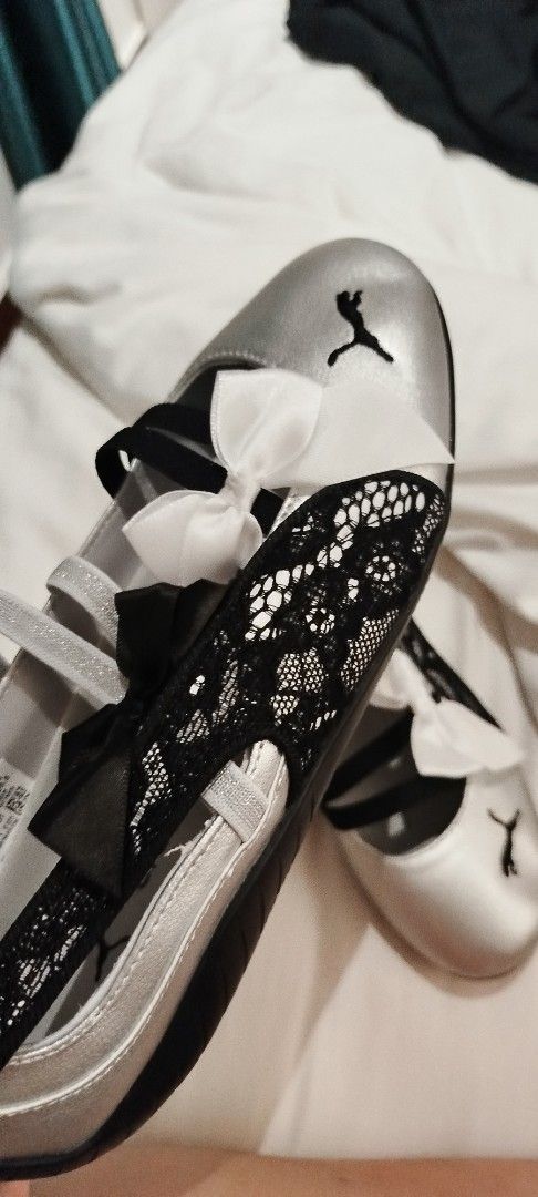 Puma Speedcat Ballet Silver Black Lace (Category: Flats & Sandals) located in Mandaluyong City. Submitted by miracleh (Listing ID 1471082365, Image 3). Description: - Brand: Puma Speedcat Ballet flats - Color: Silver with black and white ribbon bows - Features: Criss-cross elastic top straps and stylish black lace outer details - Condition: Brand new, unworn, with original tags still attached inside - Provenance: Purchased from Giay Trung (receip