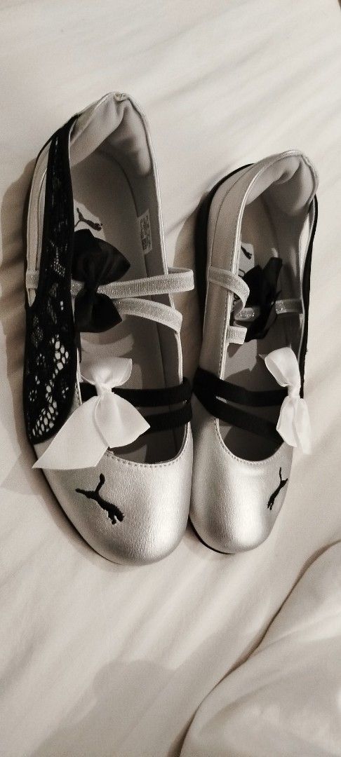 Puma Speedcat Ballet Silver Black Lace (Category: Flats & Sandals) located in Mandaluyong City. Submitted by miracleh (Listing ID 1471082365, Image 2). Description: - Brand: Puma Speedcat Ballet flats - Color: Silver with black and white ribbon bows - Features: Criss-cross elastic top straps and stylish black lace outer details - Condition: Brand new, unworn, with original tags still attached inside - Provenance: Purchased from Giay Trung (receip