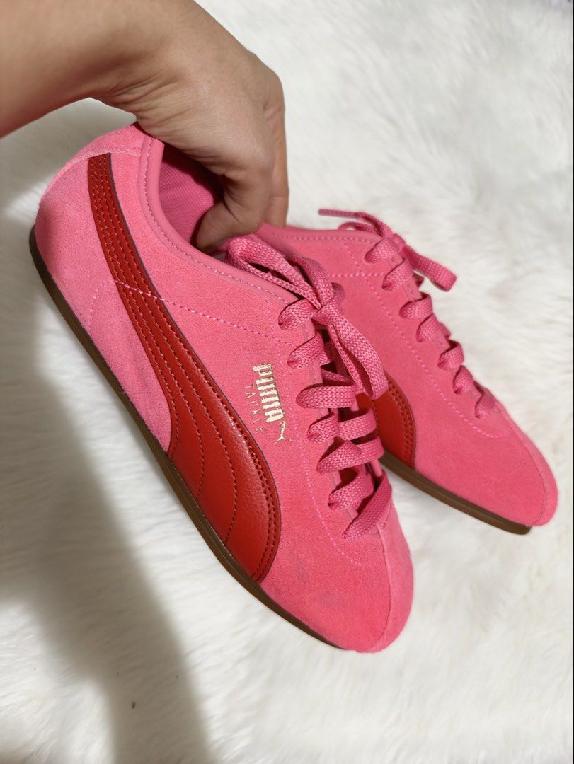 Puma Tackle Sneakers (Category: Sneakers) located in Tiaong. Submitted by beautybyrosie (Listing ID 1471056336, Image 1). Description: - Brand: Puma Tackle Sneakers authentic bought in USA - Material: Pink suede upper with red leather stripes - Details: Gold foil branding, red heel accent with gold cat logo, and matching pink laces - Comfort: SoftFoam comfort insoles - Sole: Classic gum rubber sole - Condition: Brand new no box Buyers pay the shi