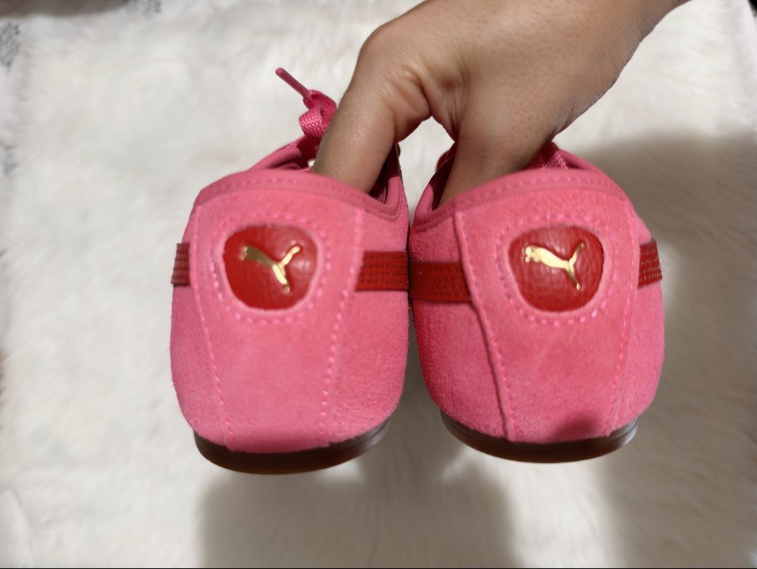 Puma Tackle Sneakers (Category: Sneakers) located in Tiaong. Submitted by beautybyrosie (Listing ID 1471056336, Image 3). Description: - Brand: Puma Tackle Sneakers authentic bought in USA - Material: Pink suede upper with red leather stripes - Details: Gold foil branding, red heel accent with gold cat logo, and matching pink laces - Comfort: SoftFoam comfort insoles - Sole: Classic gum rubber sole - Condition: Brand new no box Buyers pay the shi