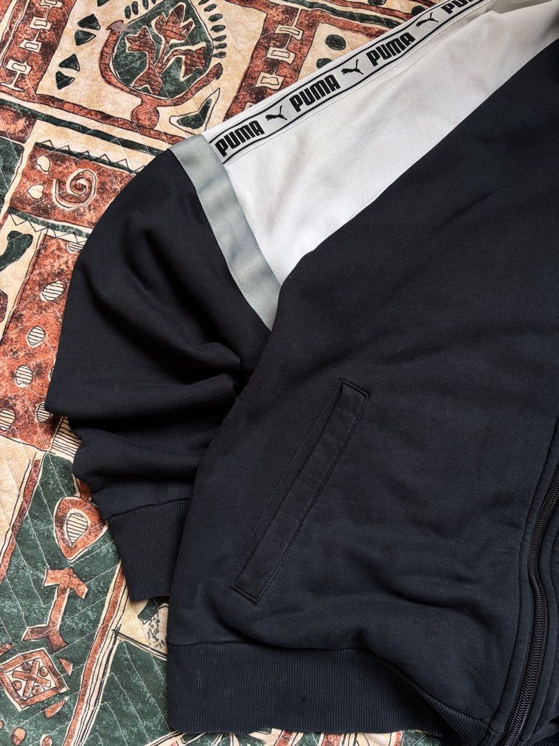 Puma XTG track Jacket (Category: Coats, Jackets and Outerwear) located in Baguio. Submitted by zojythriftph (Listing ID 1471025983, Image 3). Description: 26.5 × W20- Large Condition: Good used condition Flaws: Minor fraying on sleeve cuffs and small holes. Please manage expectations and check photos for details before buying. Color Rate- 9/10 Mine:290 📌 Disclaimer: For reselling purposes only. All branded items are thrifted/preloved. Wear more.