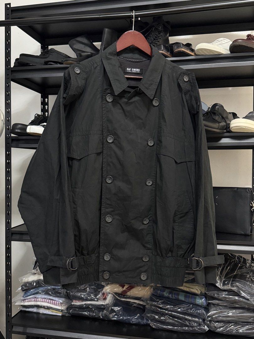 Raf Simons - S/S02 - “Fear Generation” Trench Bomber Jacket (Category: Coats, Jackets and Outerwear) located in Pasig City. Submitted by on_the_trend (Listing ID 1471094577, Image 2). Description: Tagged size: 46 Condition: 9/10 Material: 100% Cotton Made in: Belgium Measurement: Width: 27 inches Length: 29.5 inches.