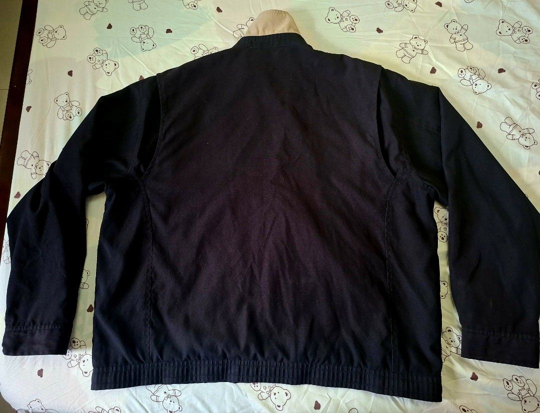 Ralph Lauren Black Bi-Swing Harrington Jacket (Category: Coats, Jackets and Outerwear) located in Rizal. Submitted by carou66859 (Listing ID 1470992139, Image 3). Description: The image shows a black Polo Ralph Lauren Harrington zip-up jacket featuring a small embroidered Polo Pony logo on the chest and a plaid-lined collar.Size 26 inches width and 27 inches length.The estimated retail price for a new Polo Ralph Lauren Bi-Swing Windbreaker / Harr