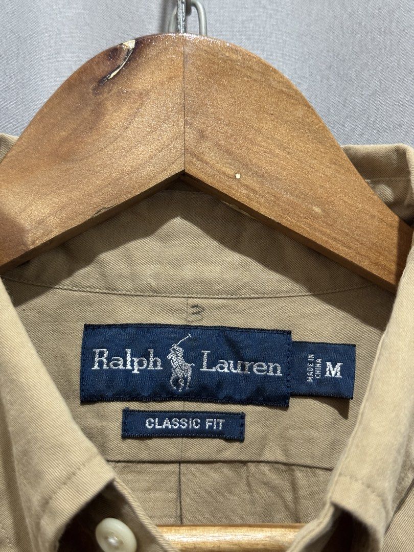 Ralph Lauren Brown Buttondown Polo (Category: Formal Shirts) located in Meycauayan. Submitted by itstimothrifts (Listing ID 1471006094, Image 3). Description: Ralph Lauren Brown Buttondown Polo Excellent Condition Dot stains (see last pic) M on tag fits XL W 23.5 L 30.5.