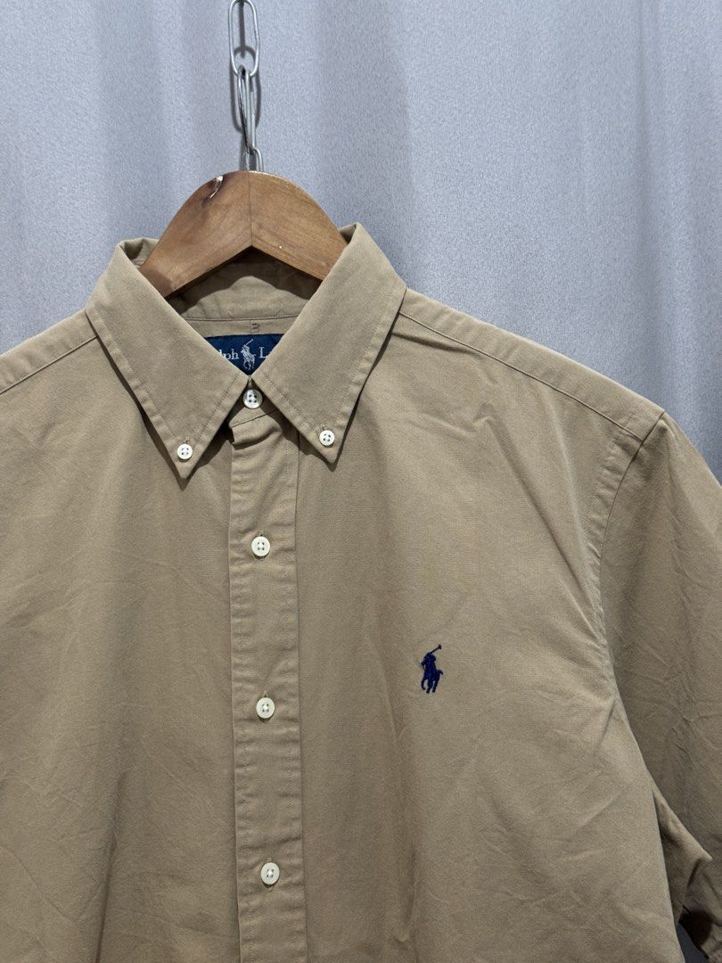 Ralph Lauren Brown Buttondown Polo (Category: Formal Shirts) located in Meycauayan. Submitted by itstimothrifts (Listing ID 1471006094, Image 2). Description: Ralph Lauren Brown Buttondown Polo Excellent Condition Dot stains (see last pic) M on tag fits XL W 23.5 L 30.5.