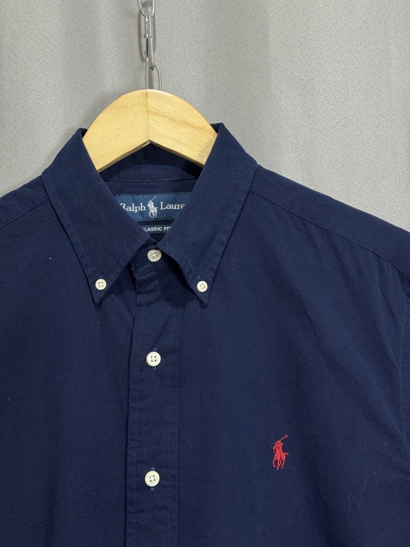 Ralph Lauren Dark Blue Buttondown Polo (Category: Formal Shirts) located in Meycauayan. Submitted by itstimothrifts (Listing ID 1471006236, Image 2). Description: Ralph Lauren Dark Blue Buttondown Polo Excellent Condition No flaws M on tag fits XL W 23.5 L 31.5 .