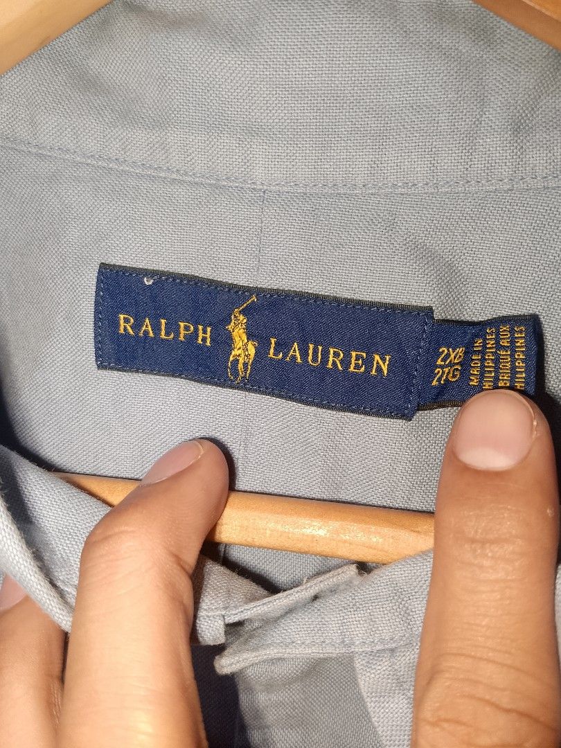 Ralph Lauren Light Blue Button Down Shirt 2XB (Category: Tshirts & Polo Shirts ) located in Manila. Submitted by mjthrifted_second (Listing ID 1470991644, Image 2). Description: - Brand: Ralph Lauren - Color: Light blue with dark blue embroidered pony logo - Style: Long sleeve oxford button-down shirt with collar - Size: 2XB (Plus size) -Dimes: 30/32 - Origin: Made in the Philippines.