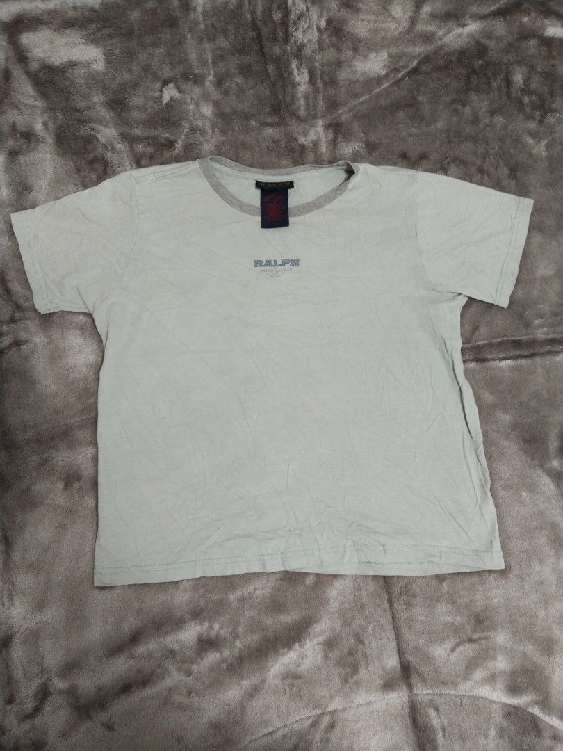 Ralph Lauren Ringer Tee — Size M (Category: Tshirts & Polo Shirts ) located in Mabalacat. Submitted by al_amin_thrift (Listing ID 1471062858, Image 1). Description: Ralph Lauren Ringer Tee — Size M 21*19 ✔️ Authentic Ralph Lauren — established 1967 ✔️ Light pale green body with heather grey ringer neckline ✔️ Classic "RALPH" chest print ✔️ 100% cotton — soft & lightweight ✔️ Size: Medium ✔️ Measurements: (please share length & width and I'll add 