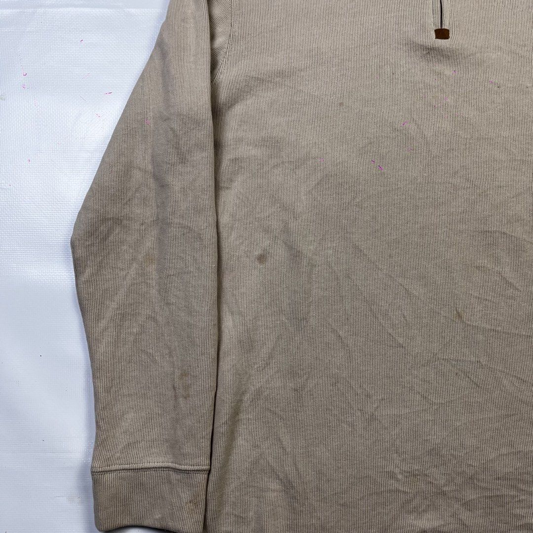 Ralph Lauren Tan Quarter Zip Pullover Sweater (Category: Coats, Jackets and Outerwear) located in Lucena. Submitted by nifty_finds (Listing ID 1470976419, Image 2). Description: - Brand: Ralph Lauren - Style: Quarter-zip pullover with high collar and leather zipper pull - Color/Fabric: Tan ribbed fabric with brown embroidered chest logo - Size: Medium - Yellow Stains .