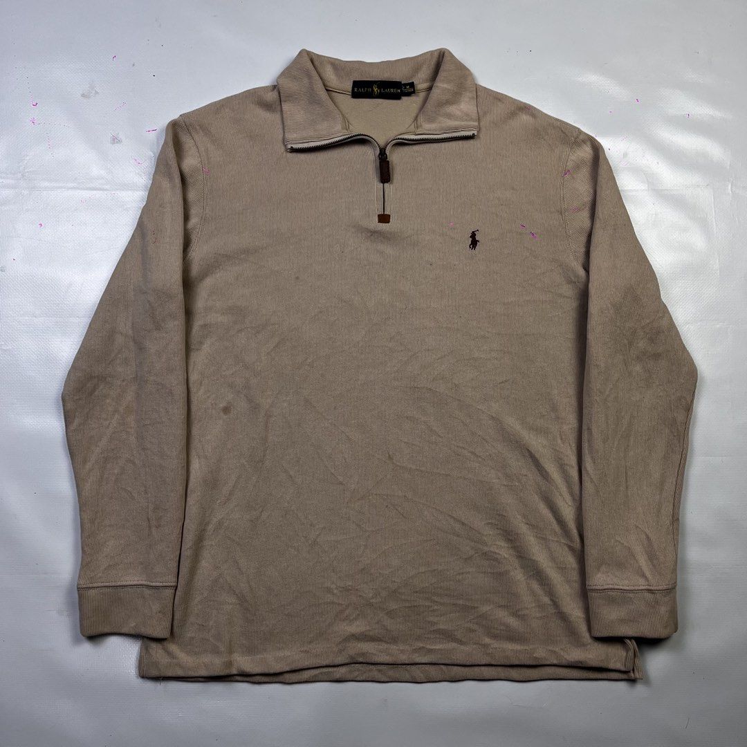 Ralph Lauren Tan Quarter Zip Pullover Sweater (Category: Coats, Jackets and Outerwear) located in Lucena. Submitted by nifty_finds (Listing ID 1470976419, Image 1). Description: - Brand: Ralph Lauren - Style: Quarter-zip pullover with high collar and leather zipper pull - Color/Fabric: Tan ribbed fabric with brown embroidered chest logo - Size: Medium - Yellow Stains .