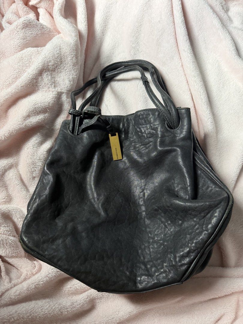 REBEANCO Genuine Leather (Category: Luxury Bags & Wallets) located in Manila. Submitted by shefindshope (Listing ID 1470981257, Image 1). Description: may mga signs of usage and rubs sa mga corner, but minimal. Nawala na rin iyong isang charm niya. Needs cleaning and negotiable ang price☺️.