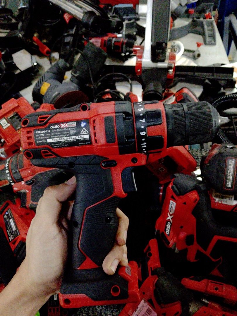 Red and Black Power Tool with Handle (Category: Construction Tools & Equipment) located in Manila. Submitted by kamanowkhmr (Listing ID 1470941221, Image 2). Description: - Color: Striking red and black design - Design: Large top handle for easy gripping and comfortable use - Features: Conveniently placed power button near the top grip and included black hose attachment - Condition: Used with some stickers/labels on the body, but fully functional