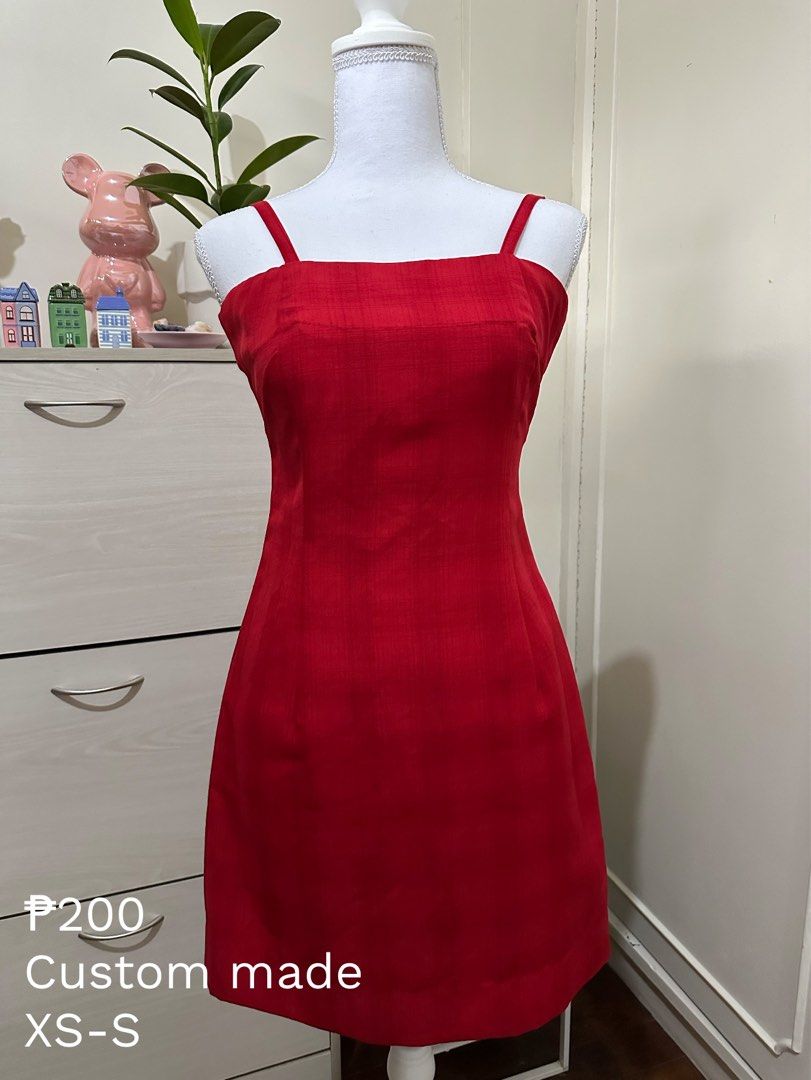 Red Custom Made Square Neck Spaghetti Strap Mini Dress XS-S (Category: Dresses) located in Antipolo. Submitted by wxyz9876 (Listing ID 1471057539, Image 1). Description: - Color: Bright red - Style: Custom-made mini dress with a fitted silhouette and structured front seaming - Neckline & Straps: Square neckline with thin spaghetti straps - Fabric: Unique textured weave - Length: Short - Size: Fits Extra Small to Small frames - Condition: Excellen