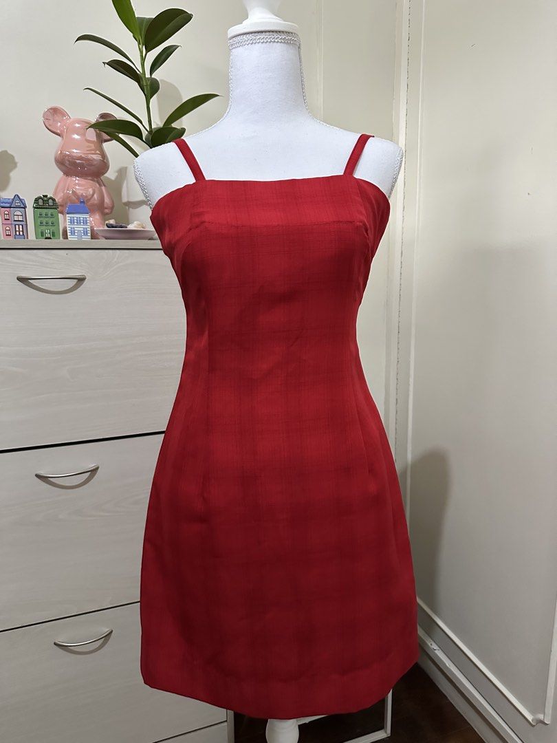 Red Custom Made Square Neck Spaghetti Strap Mini Dress XS-S (Category: Dresses) located in Antipolo. Submitted by wxyz9876 (Listing ID 1471057539, Image 2). Description: - Color: Bright red - Style: Custom-made mini dress with a fitted silhouette and structured front seaming - Neckline & Straps: Square neckline with thin spaghetti straps - Fabric: Unique textured weave - Length: Short - Size: Fits Extra Small to Small frames - Condition: Excellen