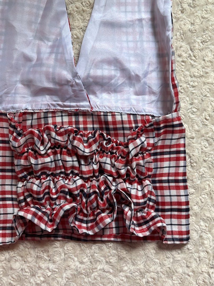 Red Plaid Halter Top with Pink Ribbon (Category: Sleeveless) located in Mandaluyong City. Submitted by namislounge (Listing ID 1470964725, Image 3). Description: Best fits small-medium - Red, white, and black plaid halter top - Self-tie straps behind the neck - Cute pink satin ribbon accent below the V-neckline - Structured fit with flattering vertical front seams.