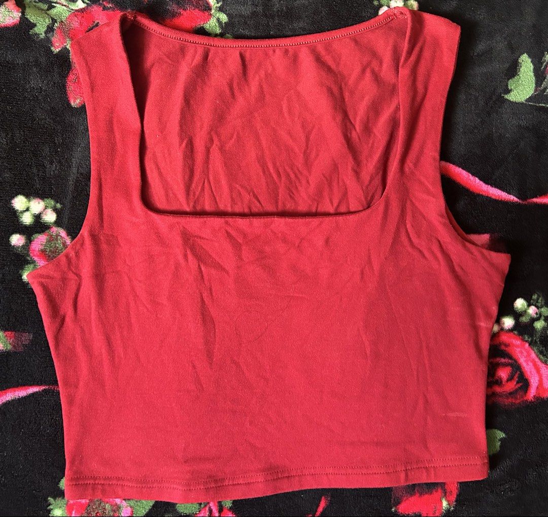 Red Square Neck Crop Top Tank Top (Category: Sleeveless) located in Manila. Submitted by coffeeislyf (Listing ID 1470990408, Image 2). Description: - Color: Bright red - Material: Soft stretch cotton - Fit: Form-fitting crop top, hits at the waist - Details: Wide square neckline with thick straps - Styling: Great basic piece, easy to pair with high-waisted jeans or skirts.