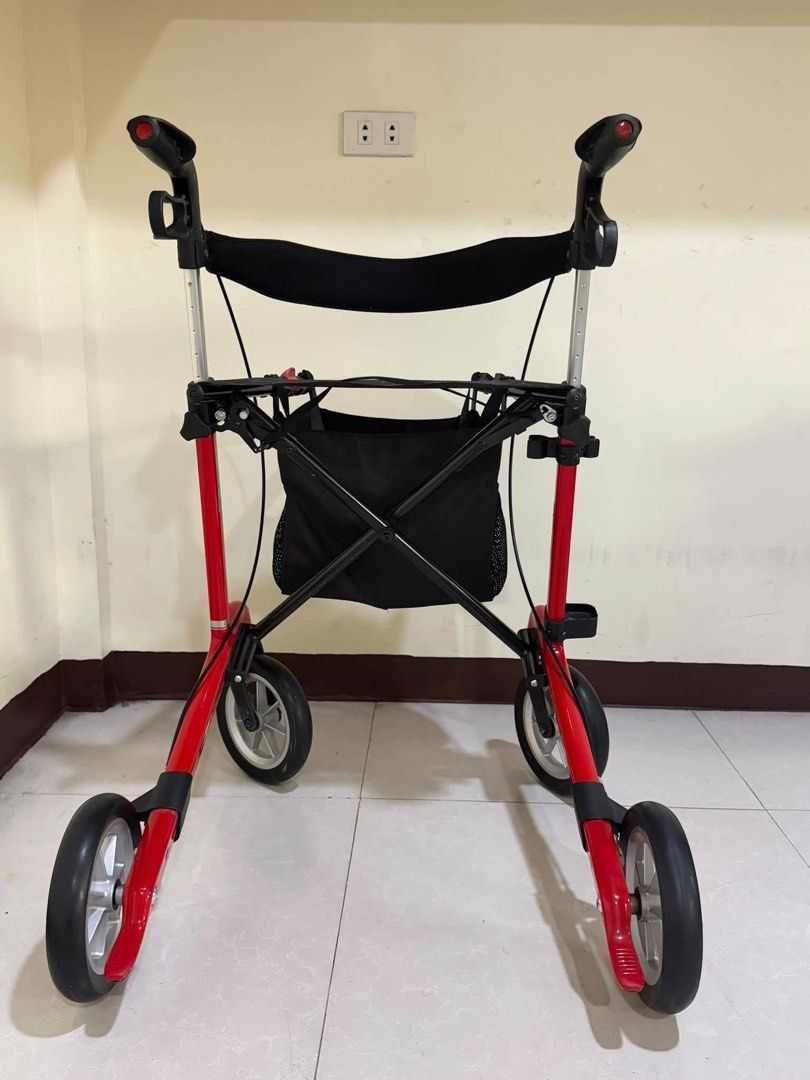 RehaSense Athlon SL Red Rollator Walker (Category: Rehabilitative Devices) located in Manila. Submitted by calmdolphin.87b0e4 (Listing ID 1470957832, Image 3). Description: - Model: RehaSense Athlon SL Mobility Rollator - Color: Red - Condition: Clean, wheels and brakes are fully functional - Manufactured: October 2020 - Weight Capacity: Supports up to 150 kg - Features: Lightweight frame, comfortable seat, and ergonomic handles - Includes: Black