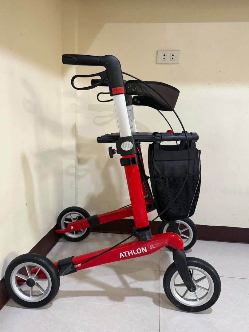 RehaSense Athlon SL Red Rollator Walker (Category: Rehabilitative Devices) located in Manila. Submitted by calmdolphin.87b0e4 (Listing ID 1470957832, Image 2). Description: - Model: RehaSense Athlon SL Mobility Rollator - Color: Red - Condition: Clean, wheels and brakes are fully functional - Manufactured: October 2020 - Weight Capacity: Supports up to 150 kg - Features: Lightweight frame, comfortable seat, and ergonomic handles - Includes: Black
