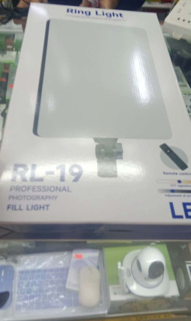 RL-19 Professional Photography Fill Light Ring Light (Category: Lighting & Studio Equipment) located in Manila. Submitted by ericklee23 (Listing ID 1470978389, Image 1). Description: - Model: RL-19 Professional Photography Fill Light - Design: Modern square panel for wider light coverage - Control: Includes a handy remote control for easy adjustments - Lighting: Fully adjustable brightness settings to suit any shoot - Packaging: Comes in its orig