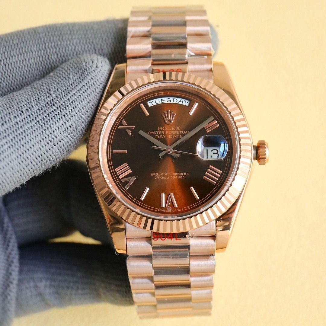 Rolex Day-Date Rose Gold Watch (Category: Luxury Watches) located in Marikina City. Submitted by coolocean-c9274f (Listing ID 1471009401, Image 3). Description: - Model: Rolex Day-Date - Material: Rose Gold - Dial: Brown sunburst with baton hour markers - Bezel: Fluted - Bracelet: Iconic President bracelet - Features: Day window at 12 o'clock and date display at 3 o'clock with cyclops lens - Condition: Brand new with factory protective plastic wr
