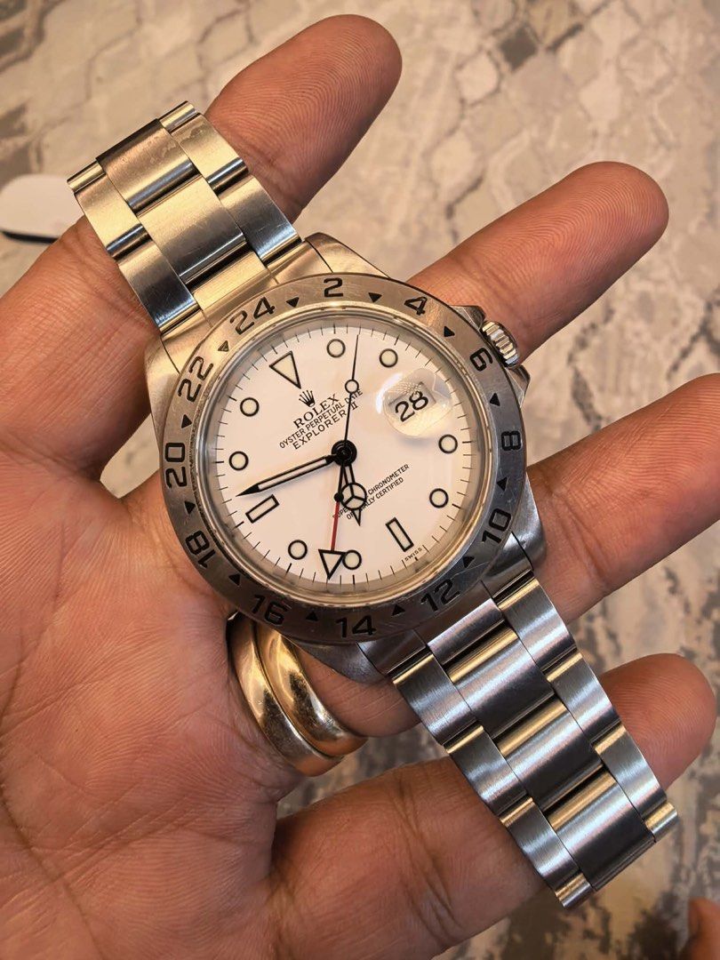 Rolex Oyster Perpetual Date Explorer II White Dial (Category: Luxury Watches) located in Cabanatuan. Submitted by albertgonzales27 (Listing ID 1471044626, Image 1). Description: Rolex explorer II 2001 box and unit avail 510k only - Authentic Rolex Explorer II - Clean white dial featuring signature red GMT hand - Stainless steel Oyster bracelet (model 78790 clasp stamp) - Fixed 24-hour bezel with sapphire crystal - Date window with magnifying cycl