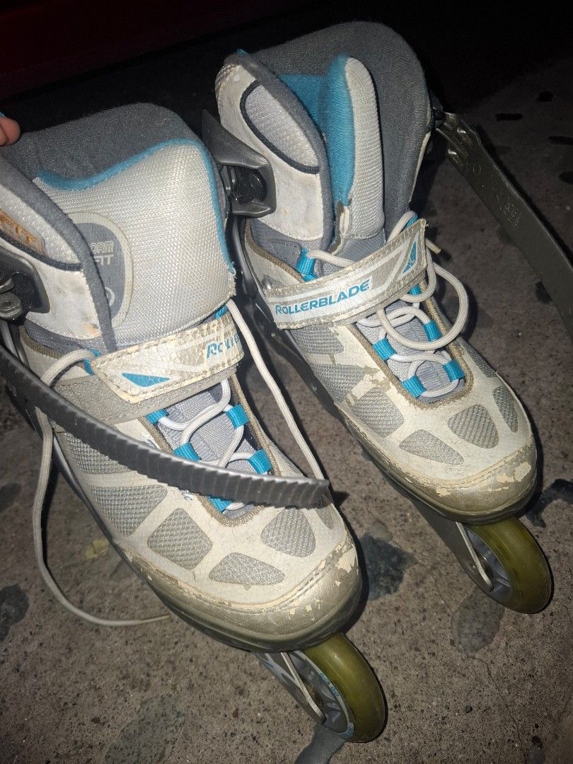 Rollerblade Inline Skates Size 38 CM 24.0 (Category: Skates, Rollerblades & Scooters) located in Taguig. Submitted by hanniedew (Listing ID 1471082615, Image 1). Description: Rollerblade inline skates, grey and white with blue accents. 80mm max wheels installed. Standard laces, velcro strap, and plastic ankle buckle closure. Size : EU 38, UK 5, US W7, CM 24.0. Some scuffs and wear marks on the toes and frame from regular use. Wheels and the insid