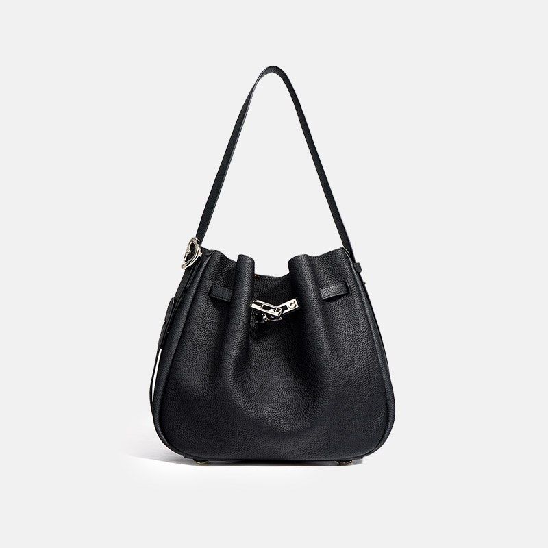 ROMYTISA Drawstring Lock Shoulder Bucket Bag (Category: Shoulder Bags) located in Manila. Submitted by caramelbliss (Listing ID 1471041796, Image 1). Description: This sophisticated bucket bag exemplifies urban simplicity with its clean lines and functional drawstring closure. Crafted from premium top-grain cowhide leather, it offers a perfect blend of luxury and practicality. The versatile design and medium size make it an ideal companion for th