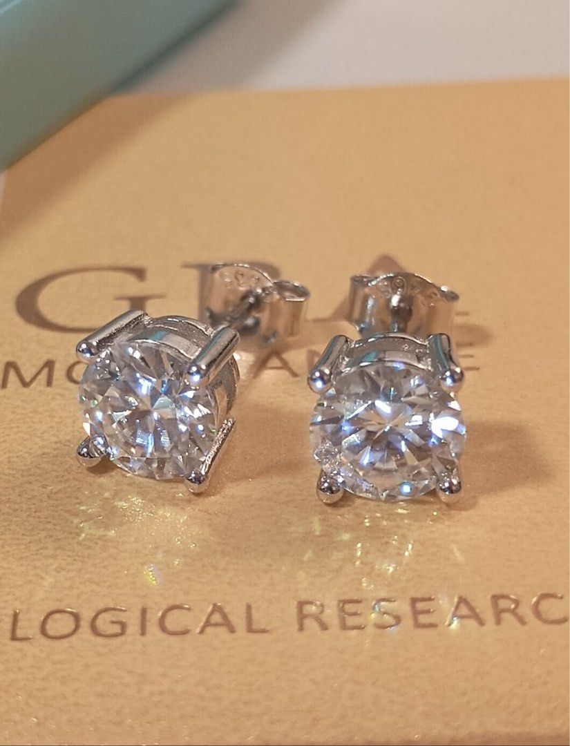Round Cut Moissanite Solitaire Stud Earrings Silver (Category: Earrings) located in Manila. Submitted by mayrecos (Listing ID 1471040090, Image 2). Description: Total of 4ct - Material: Genuine moissanite stones set in 925 sterling silver - Cut: Round brilliant cut with excellent light reflection - Setting: Classic four-prong baskets - Closure: Secure push-back closures (stamped 925) - Condition: Brand new and ready to wear.