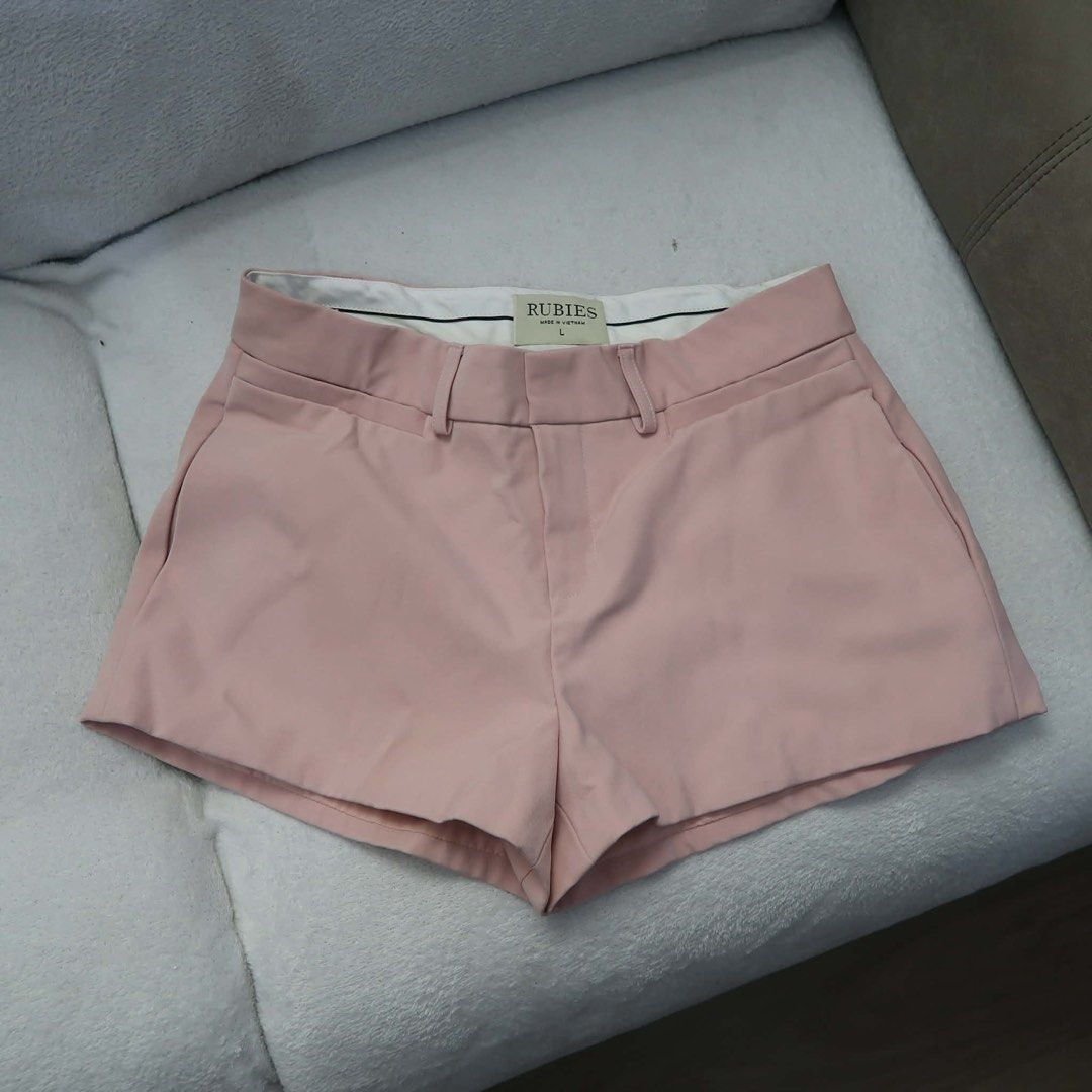Rubies Pink Tailored Shorts Size L (Category: Shorts) located in Manila. Submitted by mixi_lexi (Listing ID 1471032043, Image 2). Description: - Brand: Rubies - Color: Light Pink - Size: Large (tag inside waistband) - Features: Structured waist with belt loops, front zipper fly, and clean white inner lining - Perfect for effortless, stylish casual outfits.