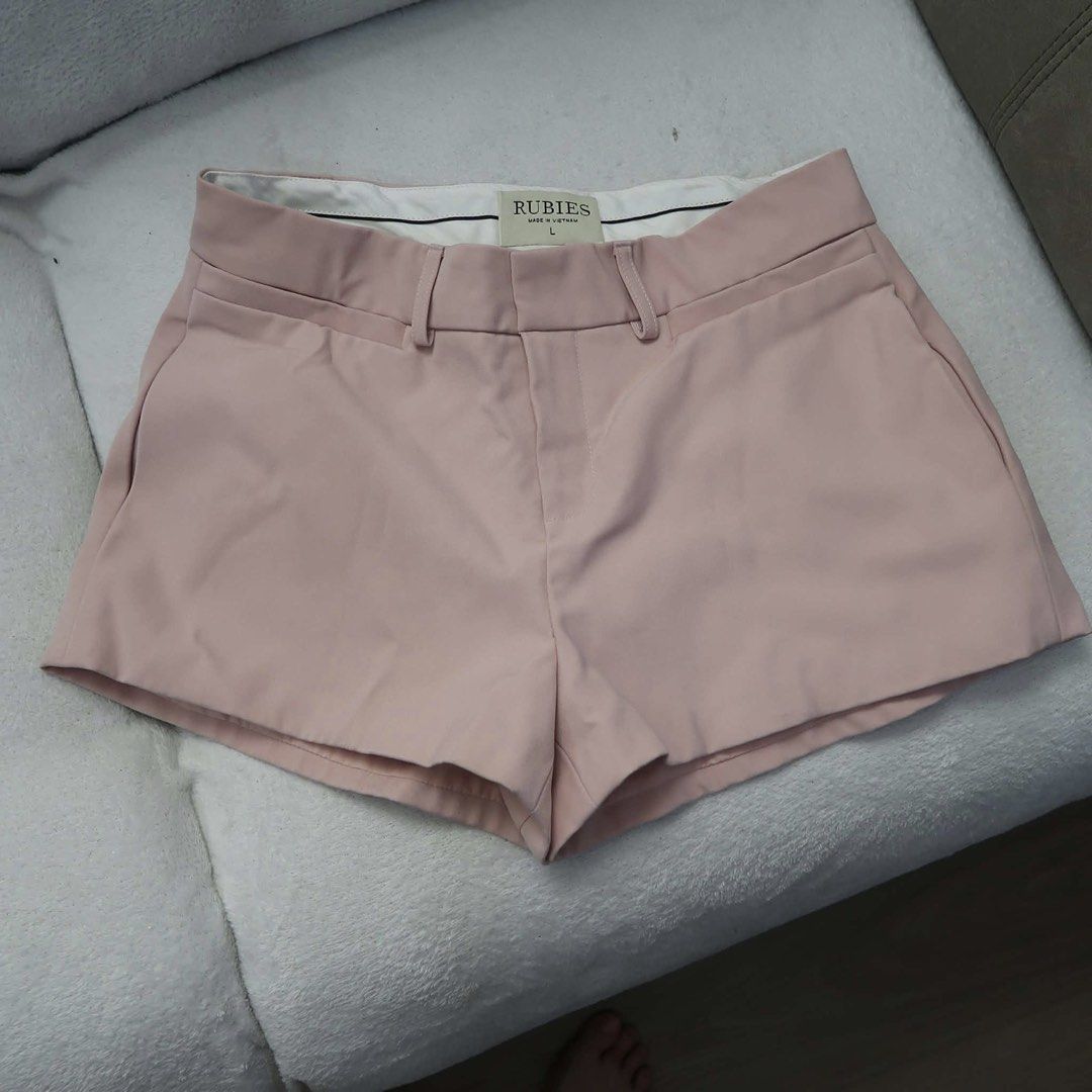 Rubies Pink Tailored Shorts Size L (Category: Shorts) located in Manila. Submitted by mixi_lexi (Listing ID 1471032043, Image 3). Description: - Brand: Rubies - Color: Light Pink - Size: Large (tag inside waistband) - Features: Structured waist with belt loops, front zipper fly, and clean white inner lining - Perfect for effortless, stylish casual outfits.