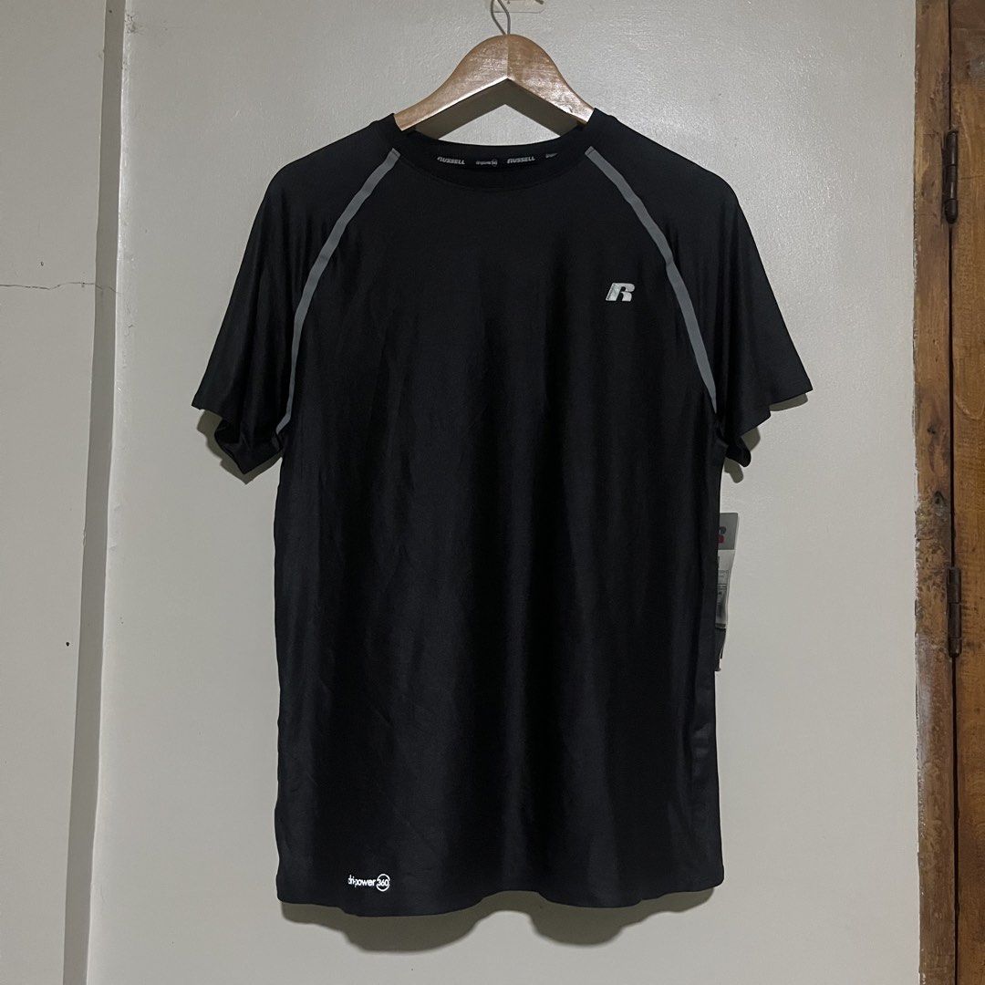 Russell Compression Tee Rich Black (Category: Tshirts & Polo Shirts ) located in Argao. Submitted by secondcyclecollection (Listing ID 1471068407, Image 2). Description: - Brand: Russell - Condition: Brand new with tags (never worn) - Color: Rich black with grey accent panels on shoulders and upper back - Size: L - Material & Tech: Dri-power 360 moisture control technology - Brandnew Condition.