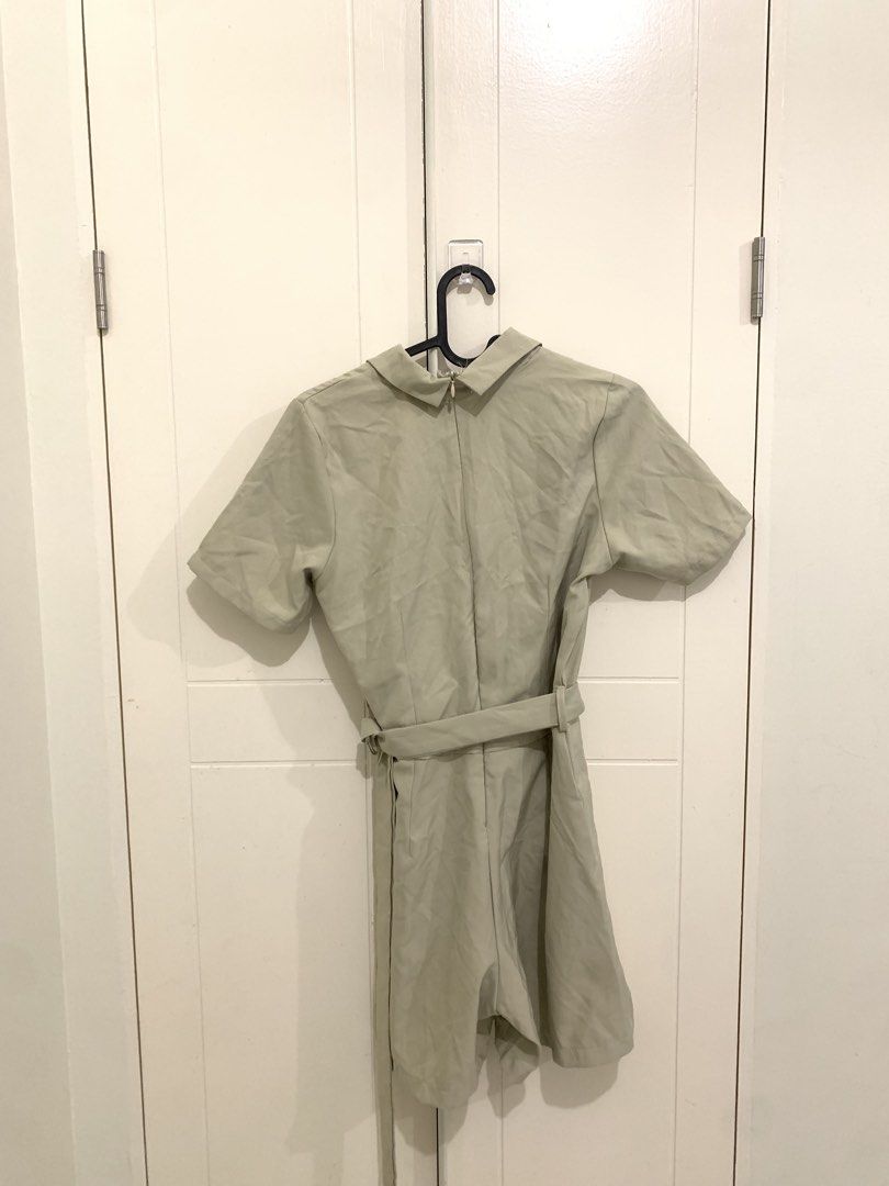 Sage Green Blazer Romper Playsuit with Belt (Category: Rompers) located in Pasig City. Submitted by lovedbyri (Listing ID 1471005555, Image 3). Description: - Color: Trendy sage green - Style: Blazer playsuit with short sleeves and notched collar - Details: Chest pocket, clean structured look, and smooth fabric - Closure: Back zipper - Bonus: Includes matching waist tie belt to cinch your waist.