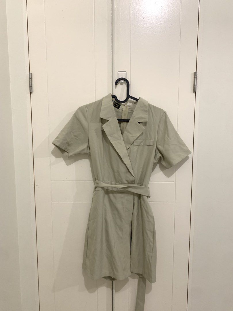 Sage Green Blazer Romper Playsuit with Belt (Category: Rompers) located in Pasig City. Submitted by lovedbyri (Listing ID 1471005555, Image 1). Description: - Color: Trendy sage green - Style: Blazer playsuit with short sleeves and notched collar - Details: Chest pocket, clean structured look, and smooth fabric - Closure: Back zipper - Bonus: Includes matching waist tie belt to cinch your waist.