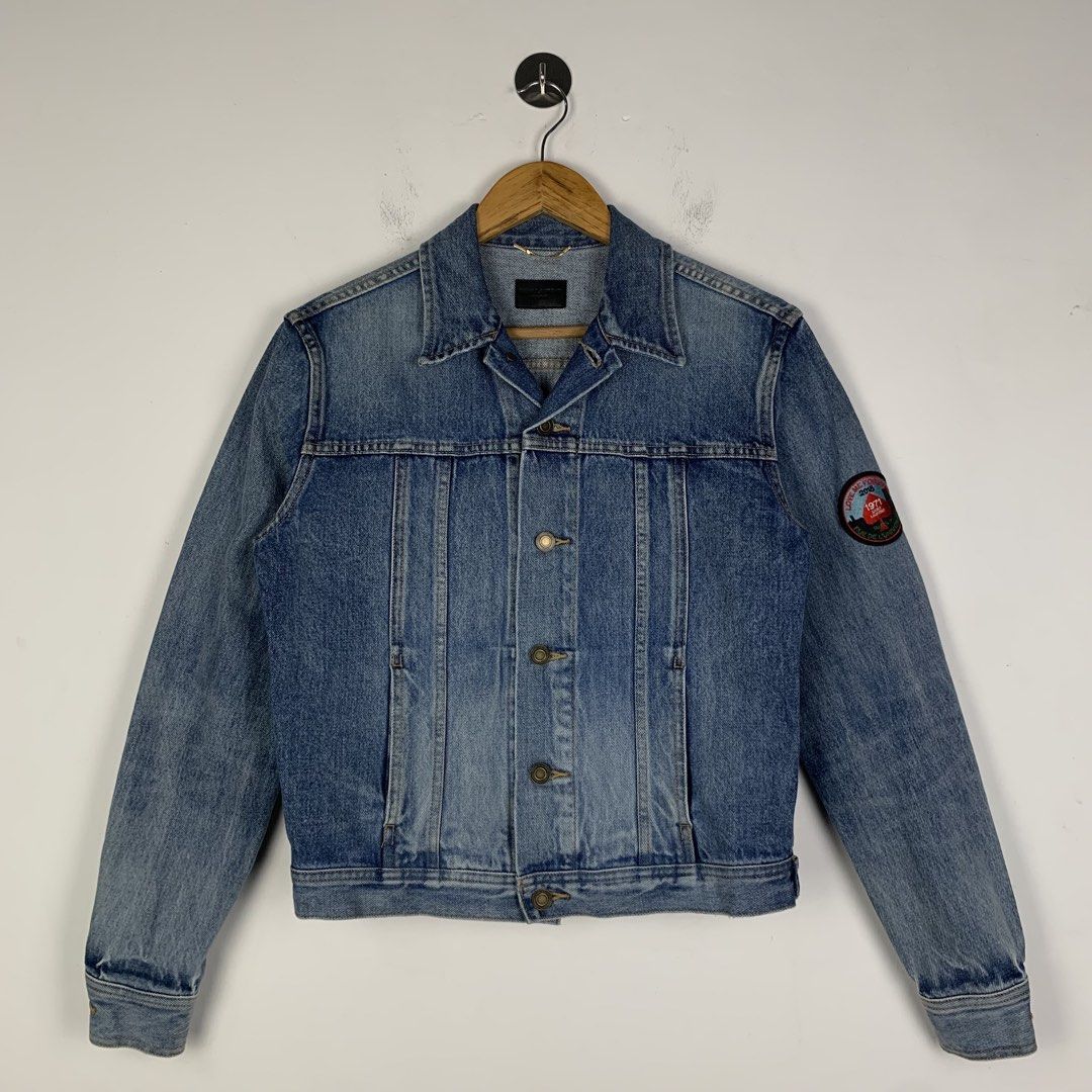 Saint Laurent 2018 Love Me Forever Patch Denim Jacket (Category: Coats, Jackets and Outerwear) located in Cavite. Submitted by francuhstuff_ph (Listing ID 1471077124, Image 1). Description: Saint Laurent 2018 Love Me Forever Patch Denim Jacket Medium Women’s Small Men’s Length: 22 Width: 20 Sleeve: 24.5 Shoulder: 17 Hem: 16.5 Used excellent condition No flaws/issues.