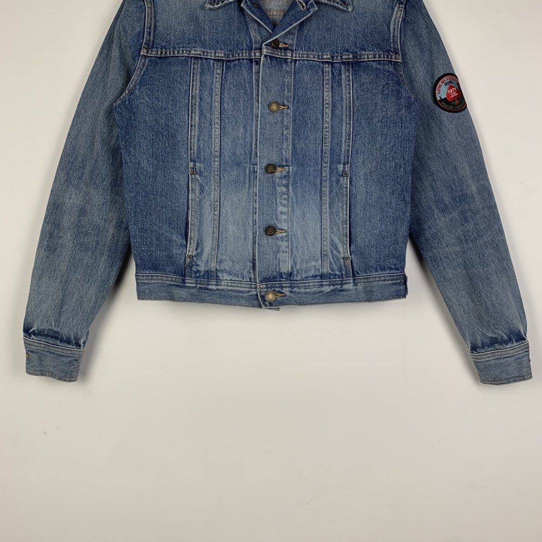 Saint Laurent 2018 Love Me Forever Patch Denim Jacket (Category: Coats, Jackets and Outerwear) located in Cavite. Submitted by francuhstuff_ph (Listing ID 1471077124, Image 3). Description: Saint Laurent 2018 Love Me Forever Patch Denim Jacket Medium Women’s Small Men’s Length: 22 Width: 20 Sleeve: 24.5 Shoulder: 17 Hem: 16.5 Used excellent condition No flaws/issues.