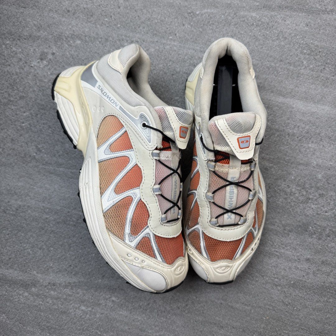 Salomon XT-Whisper Vanilla Orange Sneakers (Category: Sneakers) located in Manolo Fortich. Submitted by thrift_by_biji (Listing ID 1471088942, Image 1). Description: - Brand/Model: Salomon XT-Whisper running shoes - Colorway: Vanilla and orange - Closure: Quicklace system for easy adjustment - Upper: Lightweight mesh with supportive overlays - Comfort & Grip: Cushioned midsole and durable Contagrip rubber outsole - Condition: Clean overall with m
