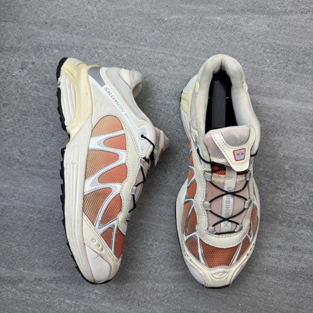 Salomon XT-Whisper Vanilla Orange Sneakers (Category: Sneakers) located in Manolo Fortich. Submitted by thrift_by_biji (Listing ID 1471088942, Image 2). Description: - Brand/Model: Salomon XT-Whisper running shoes - Colorway: Vanilla and orange - Closure: Quicklace system for easy adjustment - Upper: Lightweight mesh with supportive overlays - Comfort & Grip: Cushioned midsole and durable Contagrip rubber outsole - Condition: Clean overall with m