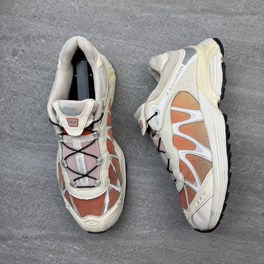 Salomon XT-Whisper Vanilla Orange Sneakers (Category: Sneakers) located in Manolo Fortich. Submitted by thrift_by_biji (Listing ID 1471088942, Image 3). Description: - Brand/Model: Salomon XT-Whisper running shoes - Colorway: Vanilla and orange - Closure: Quicklace system for easy adjustment - Upper: Lightweight mesh with supportive overlays - Comfort & Grip: Cushioned midsole and durable Contagrip rubber outsole - Condition: Clean overall with m