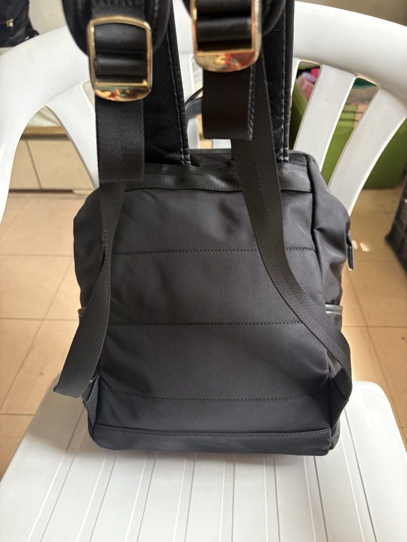 Samsonite Black Backpack with Gold Zippers (Category: Backpacks) located in Quezon City. Submitted by rottiemom (Listing ID 1470991062, Image 3). Description: - Brand: Samsonite - Color: Classic Black with elegant Gold hardware - Exterior: 2 front zippered compartments, branded gold plaque, and convenient side pockets - Straps & Handles: Top grab handles and adjustable padded shoulder straps with stylish metal buckles - Condition: Clean interior 