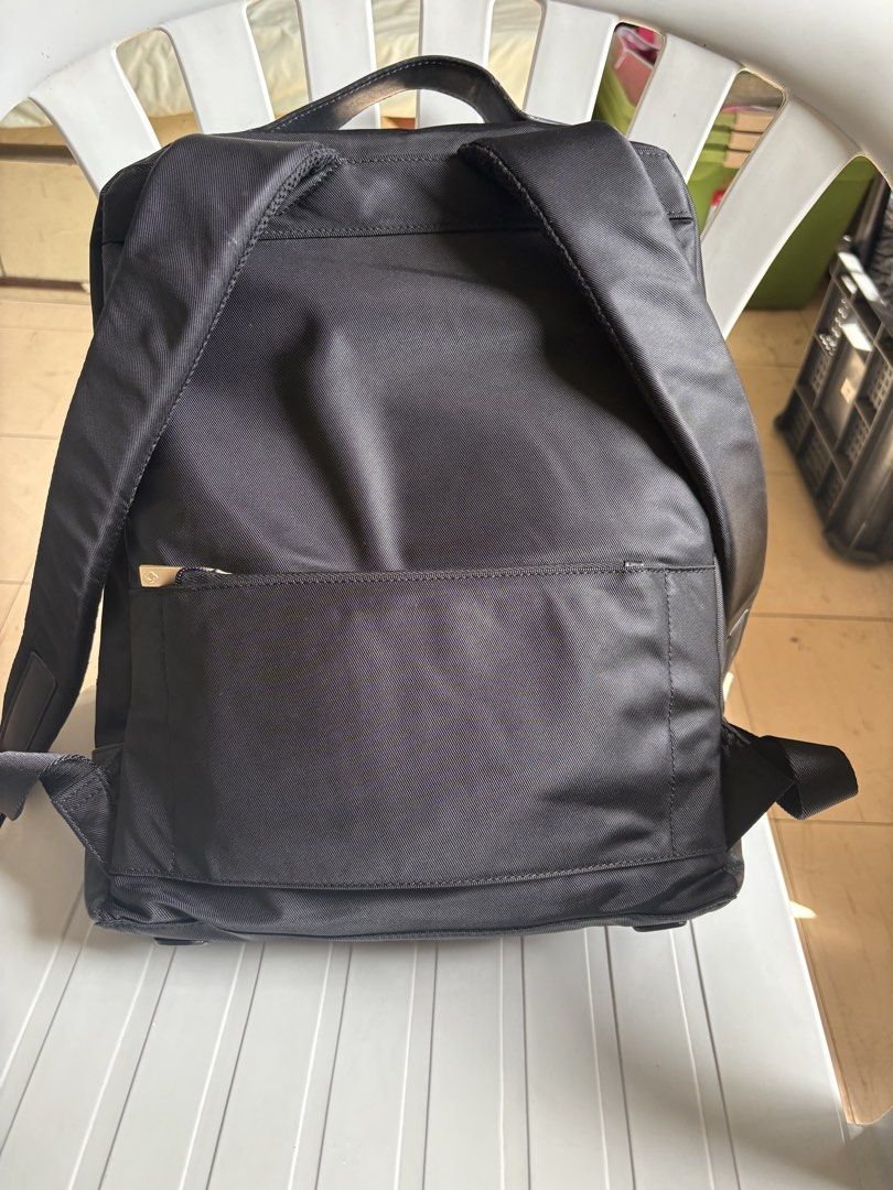 Samsonite black backpack with gold zipper and leather front pocket (Category: Backpacks) located in Quezon City. Submitted by rottiemom (Listing ID 1470991510, Image 3). Description: - Brand: Samsonite - Color: Classic Black - Material: Textured fabric body with smooth leather front pocket and base panels - Hardware: Premium gold-tone zippers and metallic gold brand logo - Comfort: Padded shoulder straps with adjustable metal buckles and a sturdy