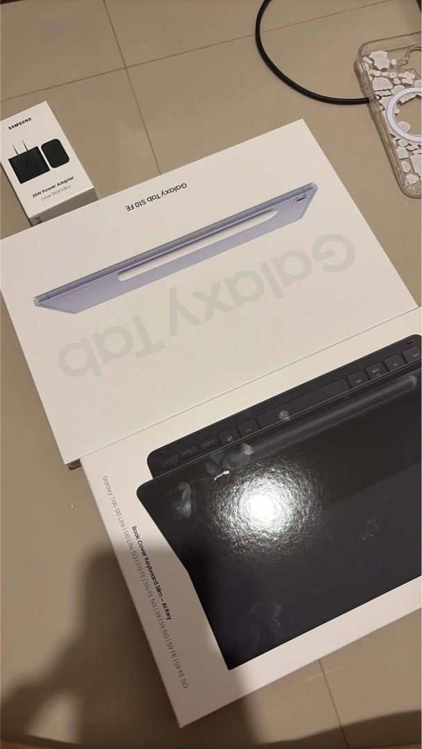 Samsung Galaxy Tab S10 FE (Category: Android) located in Bulacan. Submitted by amgclng (Listing ID 1471118603, Image 1). Description: - Samsung Galaxy Tab S10 FE running smooth One UI - Includes official Book Cover Keyboard Slim - Comes with 25W Power Adapter for fast charging - Original boxes included for the tablet, keyboard, and charger - All items are complete, tested, and ready to use DATE OF PURCHASE: OCT 24, 2026.