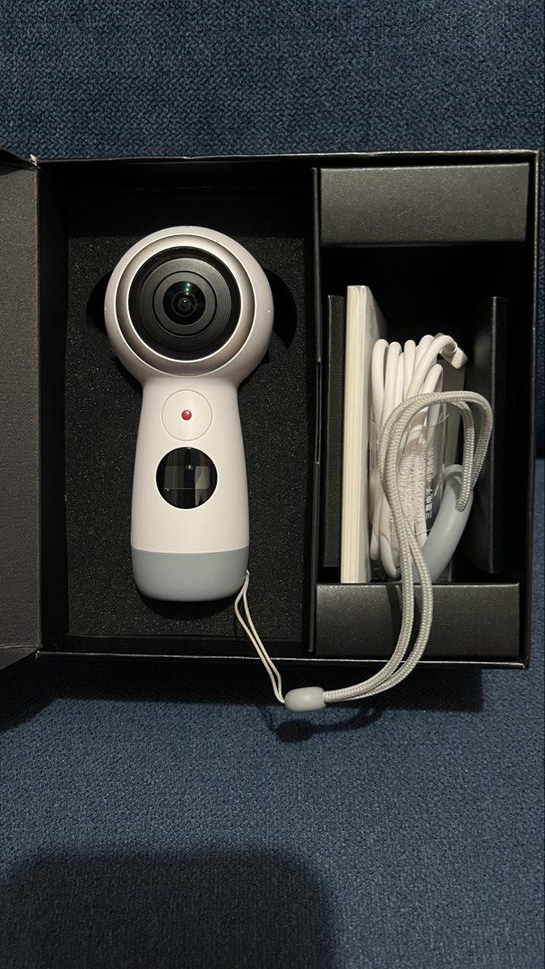 Samsung Gear 360 (2017) 360-degree camera with box (Category: Cameras) located in Bay. Submitted by ronellie (Listing ID 1471096742, Image 2). Description: - Samsung Gear 360 camera (2017 model) for full 360-degree videos and photos - Ideal tool for travel vlogs, social media, and VR content creation - Complete set includes the original black box, grey fabric pouch, wrist strap, charging cable, and manuals - All items fit neatly into the original