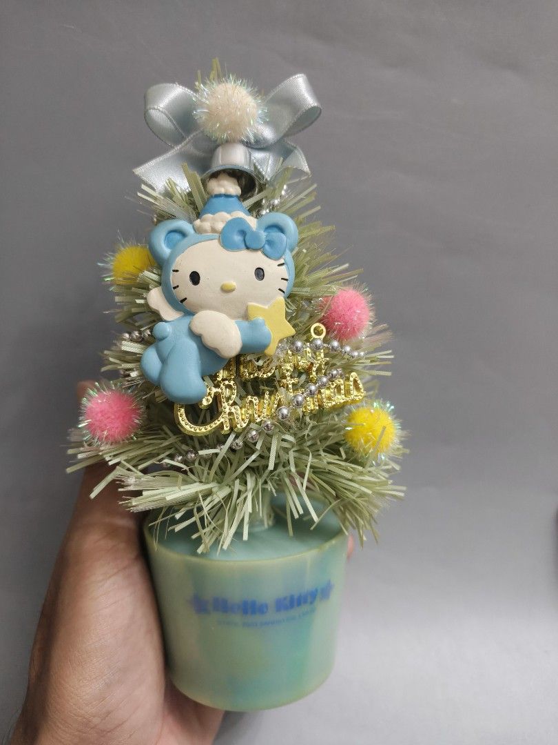 Sanrio Hello Kitty 2003 Christmas Tree Figurine (Category: Vintage Collectibles) located in Pasig City. Submitted by don200 (Listing ID 1471094790, Image 2). Description: - Authentic 2003 Sanrio Kitty vintage Christmas tree decoration - optic base Vintage Sanrio Hello Kitty Christmas Fiber Tree With light Battery operated 🧐approx 8 inches tall 🧐tested ok .