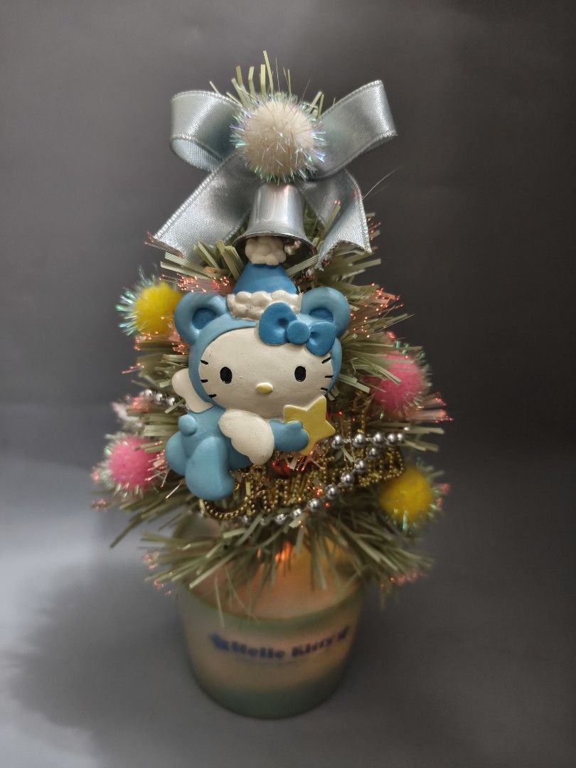 Sanrio Hello Kitty 2003 Christmas Tree Figurine (Category: Vintage Collectibles) located in Pasig City. Submitted by don200 (Listing ID 1471094790, Image 1). Description: - Authentic 2003 Sanrio Kitty vintage Christmas tree decoration - optic base Vintage Sanrio Hello Kitty Christmas Fiber Tree With light Battery operated 🧐approx 8 inches tall 🧐tested ok .