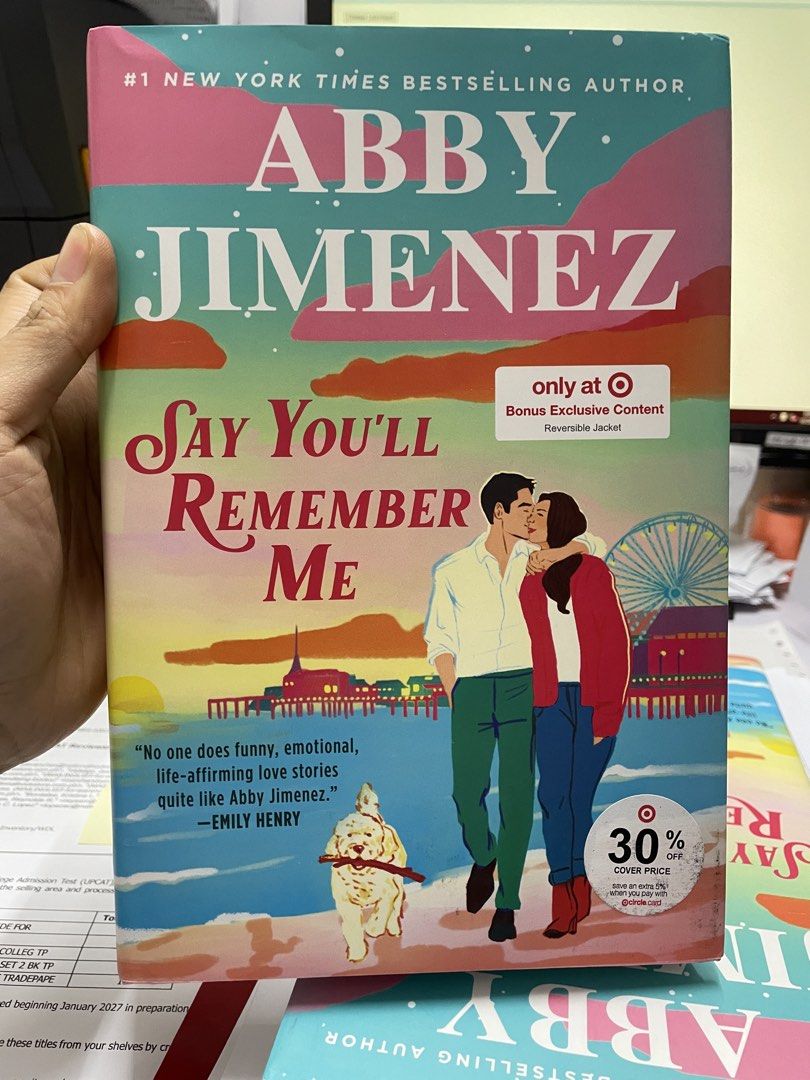 Say You'll Remember Me by Abby Jimenez (Category: Storybooks) located in Caloocan City. Submitted by addtojoyonlinestore (Listing ID 1470945047, Image 1). Description: - Title & Author: Say You'll Remember Me by NYT bestselling author Abby Jimenez - Edition: Target Exclusive Edition featuring a bonus reversible jacket - Format: Hardcover - Condition: Clean pages, well-cared for, and ready for a new reader's shelf - Genre: Popular contemporary rom